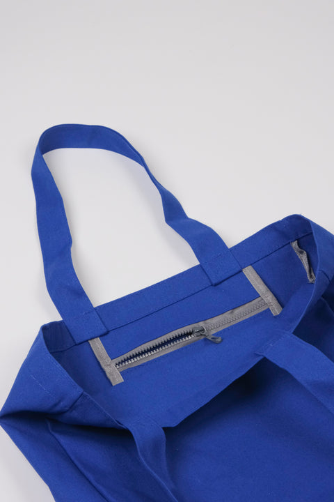 Bright blue tote inner zip detail