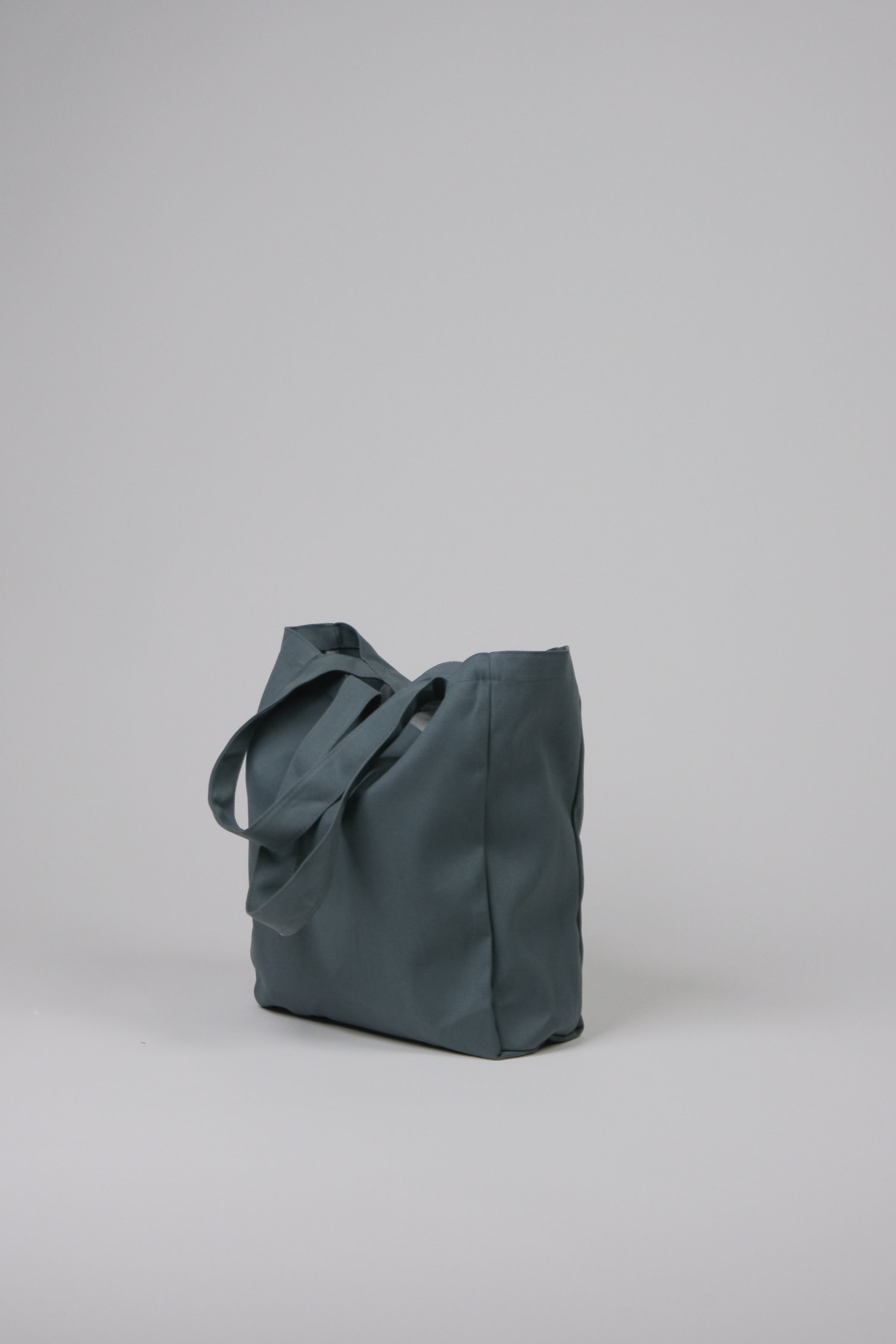 Dark Charcoal plain tote side view showing gusset