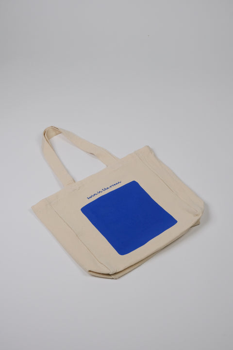 Swim in the ocean natural tote bag flat view
