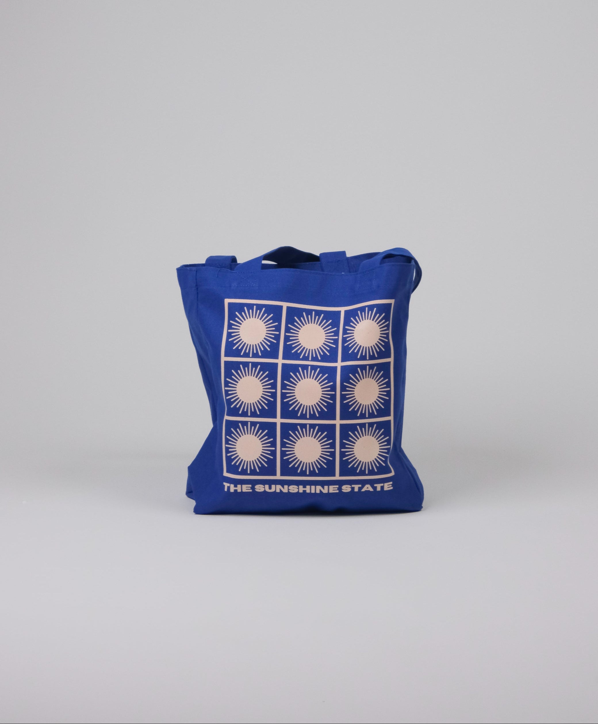 The Sunshine State Blue tote bag front view